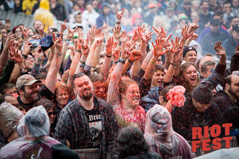Fans get doused by fake blood during a GWAR show at Riot Fest 2014. (Photo: Riot Fest)